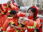 乌市举行“真正男子汉”大学生消防体验式比武 - 消防网