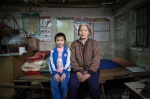 9岁女孩东莞卖菜寻亲：我病好了，父母快接我回家 - 中国日报网